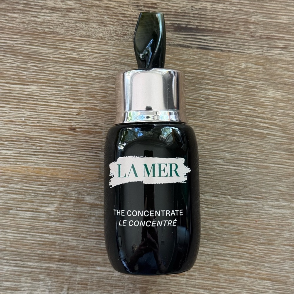 La Mer Skincare Bottle with Black and Silver Design